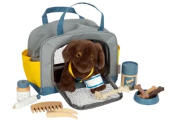 Hund mit Tasche und Pflege-Set