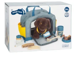 Hund mit Tasche und Pflege-Set